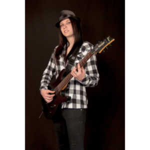 I saw an amazing picture on a web site of this female guitarist.  She was beautiful.  After a bit of searching, I was able to contact her and we did this shoot together.